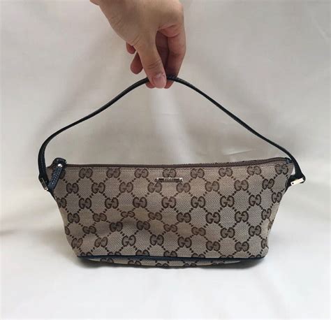 pochette gucci vintage prezzo|gucci pochette vintage.